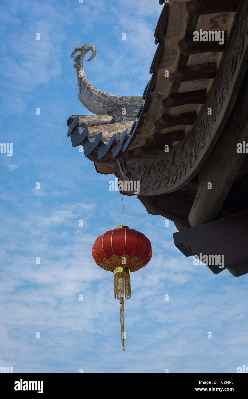 Red lanterns under the eaves Stock Photo - Alamy