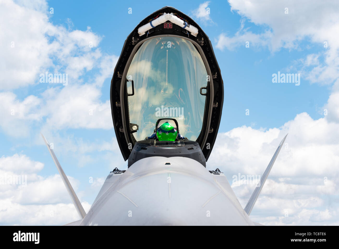 The F-22 Raptor sits on display before a performance in Beaufort, S.C., April 27, 2019. Representing the U.S. Air Force and Air Combat Command, the F-22 Demo Team travels to over 20 air shows a season showcasing the performance and capabilities of the F-22 Raptor. (U.S. Air Force photo by 2nd Lt. Samuel Eckholm) Stock Photo