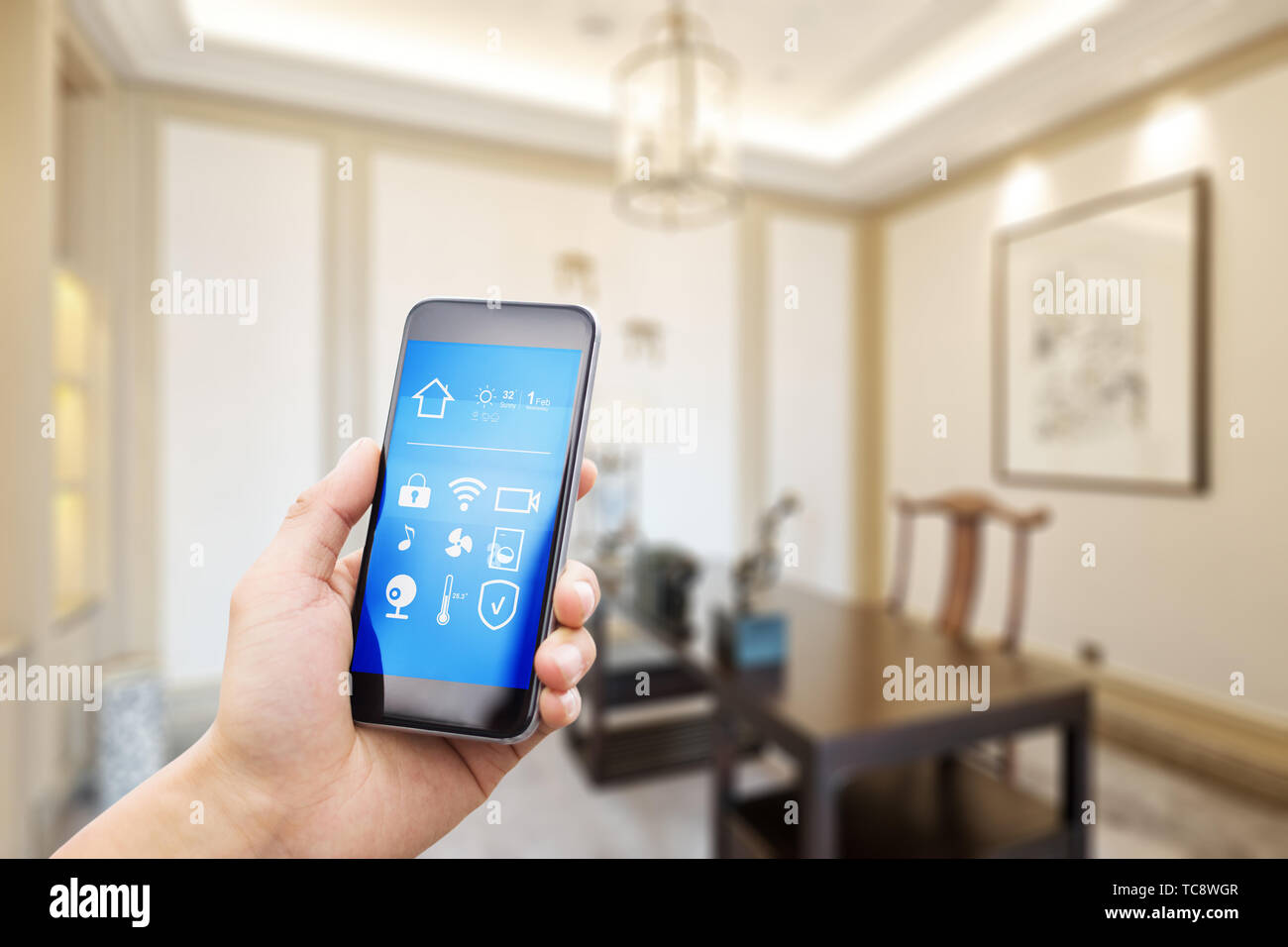 Using Phones In House mobile phone with living room in smart home Stock Photo - Alamy