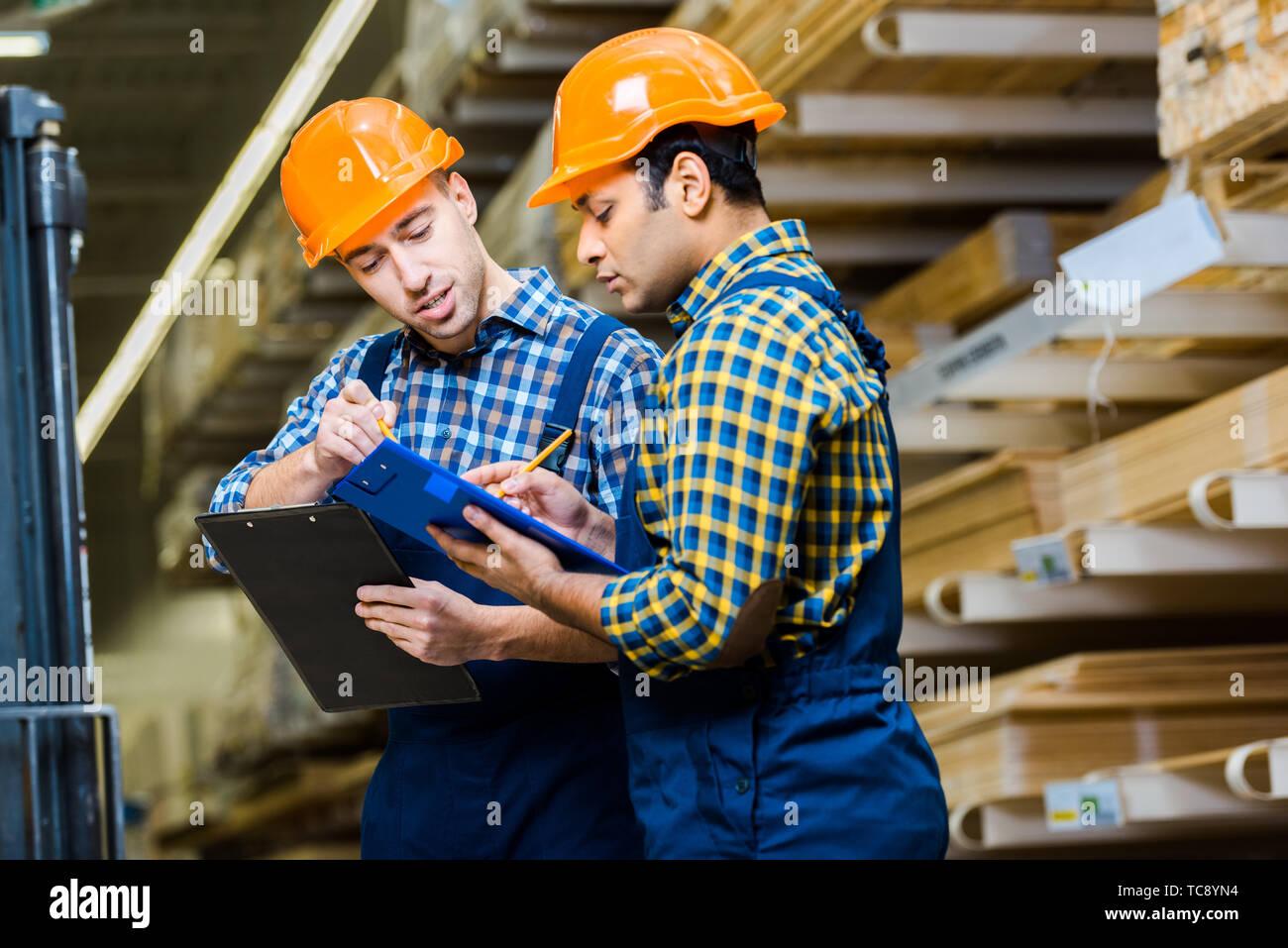 Construction workers hardhats multicultural hi-res stock photography ...