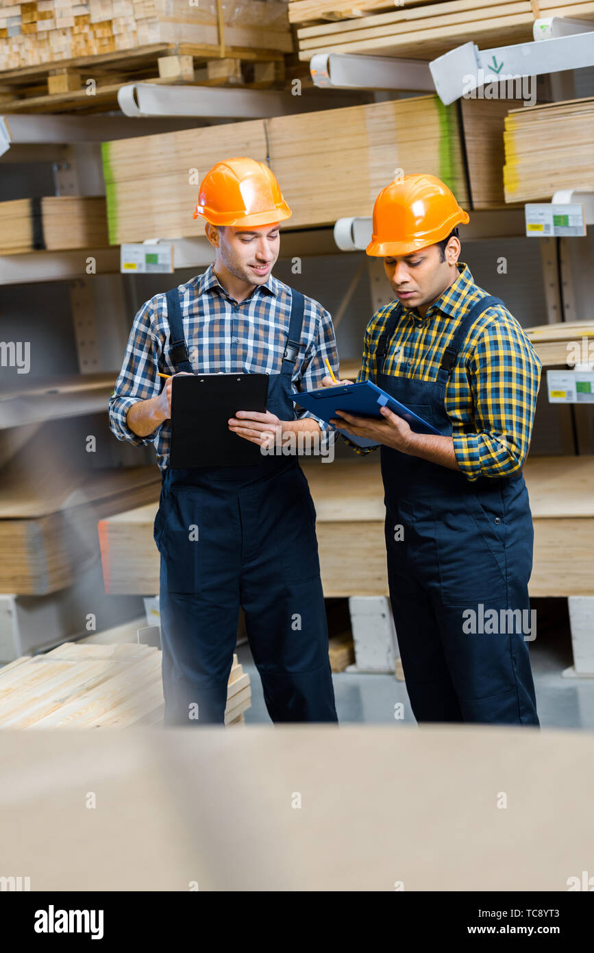 Construction workers hardhats multicultural hi-res stock photography ...