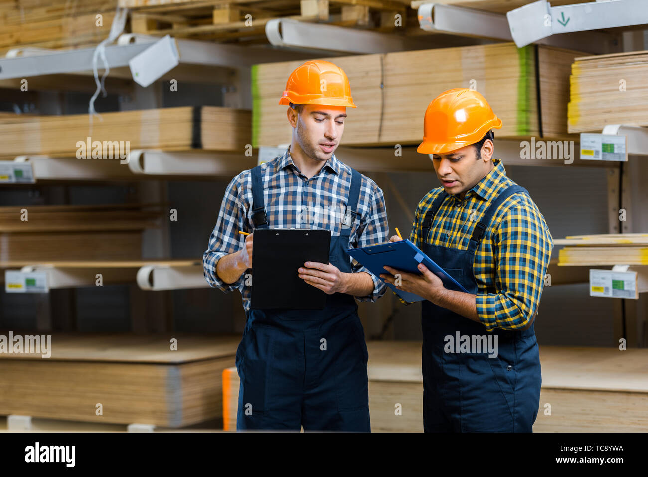 Construction workers hardhats multicultural hi-res stock photography ...