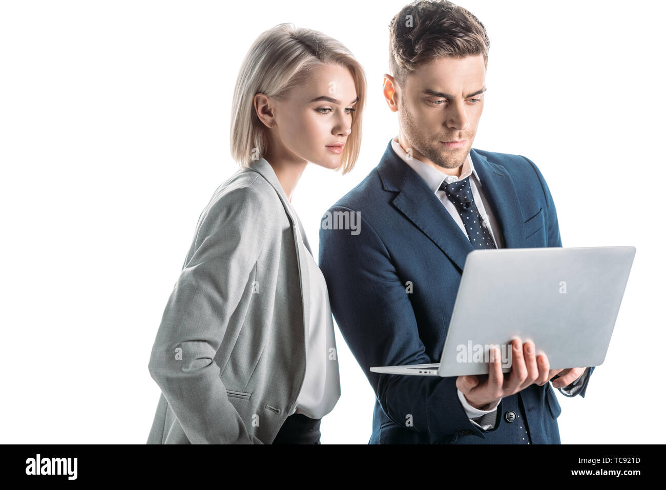 Using Computer With Partner Business partners using laptop hi-res stock photography and images - Alamy