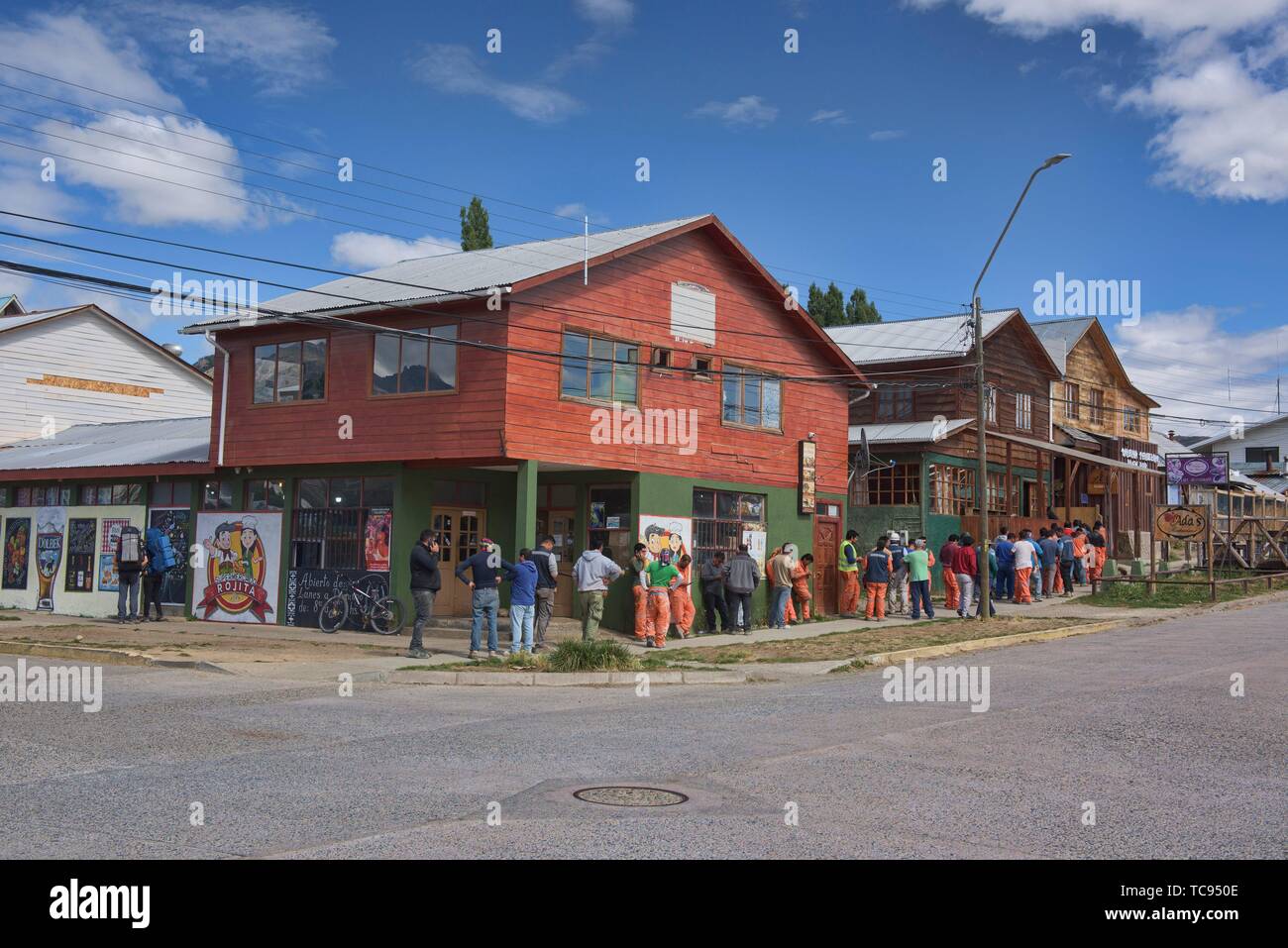 Local workers celebrating payday in Cochrane, Patagonia, Aysen, Chile. Stock Photo