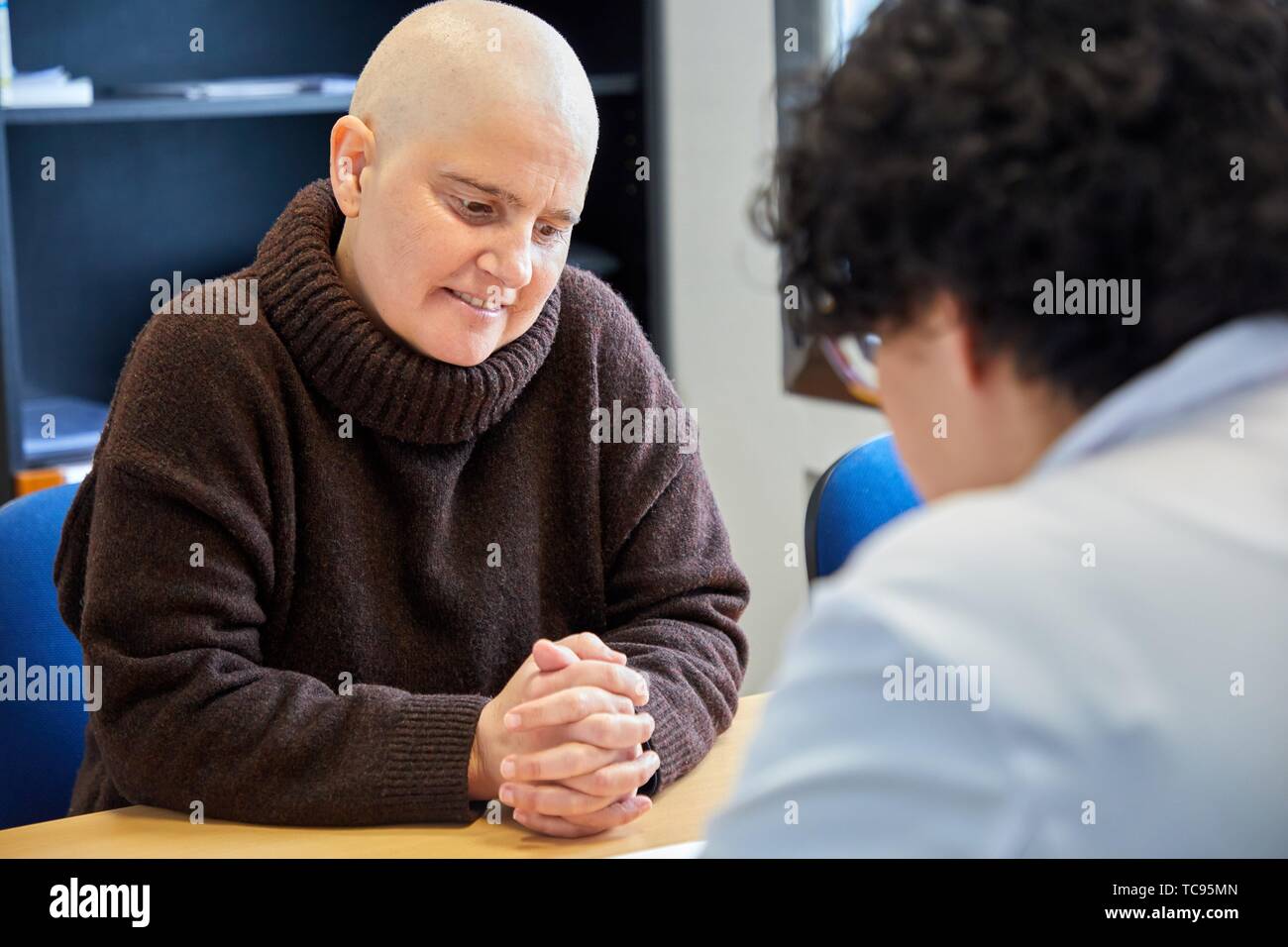 Doctor with cancer patient in medical consultation, Oncology, Hospital Donostia, San Sebastian, Gipuzkoa, Basque Country, Spain Stock Photo
