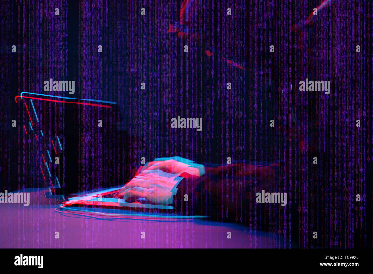 Hacker working with laptop in dark room with digital interface around. Image with glitch effect. Stock Photo