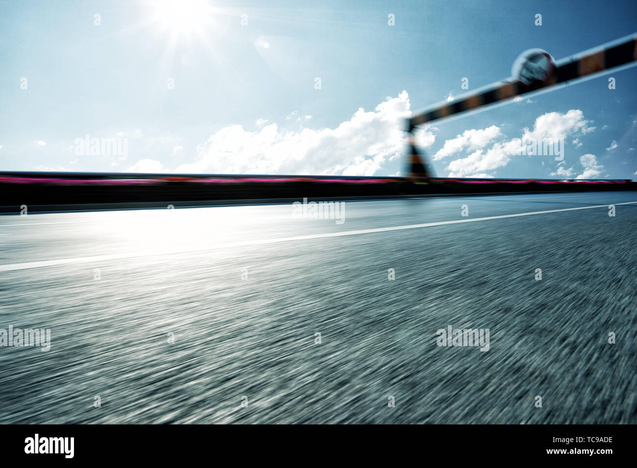 Empty asphalt road in blue cloudsky Stock Photo