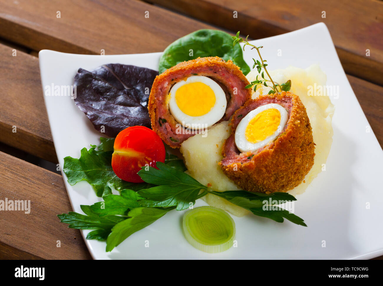 Hardboiled quail egg wrapped in minced meat, breaded and fried