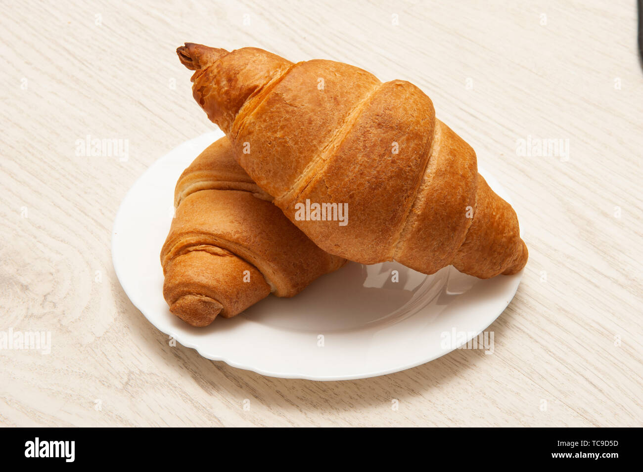 Croissants on a plate. Top view Stock Photo