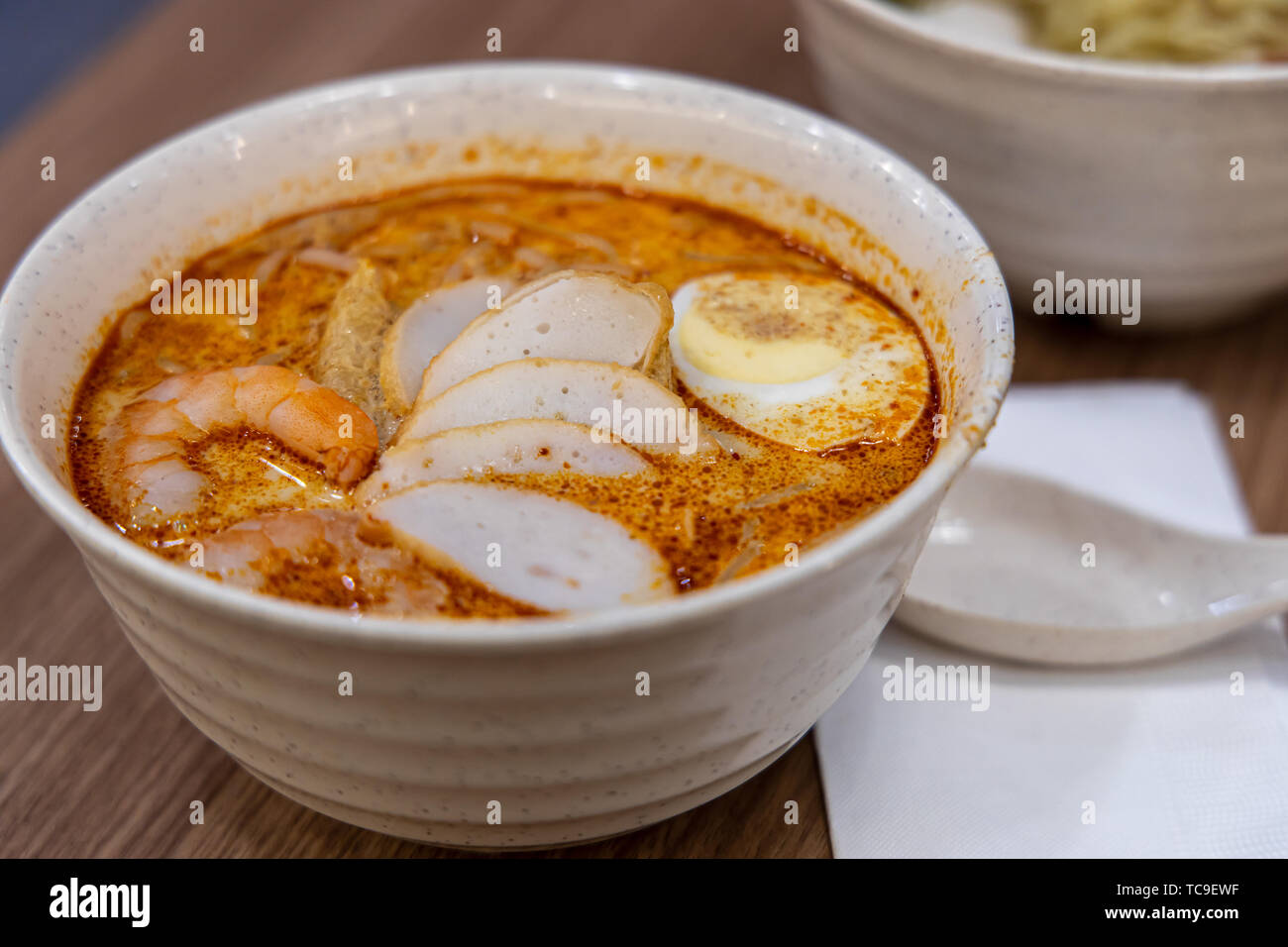Laksa is a spicy noodle soup popular in Peranakan cuisine of Southeast