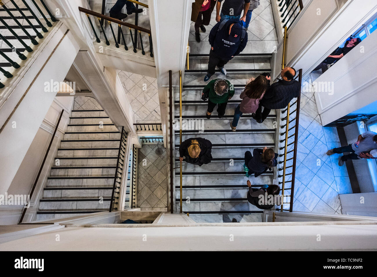 People walk up and down the main staircase inside the Albertina museum and art gallery in Vienna on 03/11/2018.Picture by Julie Edwards Stock Photo