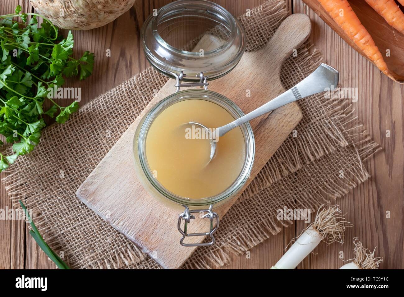 Glass jar with chicken bone broth, top view Stock Photo Alamy
