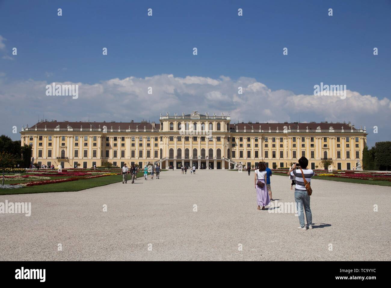 Vienna, Austria - July 06 2018: ''Schonbrunn'' palace (Schloss Schönbrunn) and the park with a blue sky and cloudsâ. “ Stock Editorial Photo. Stock Photo