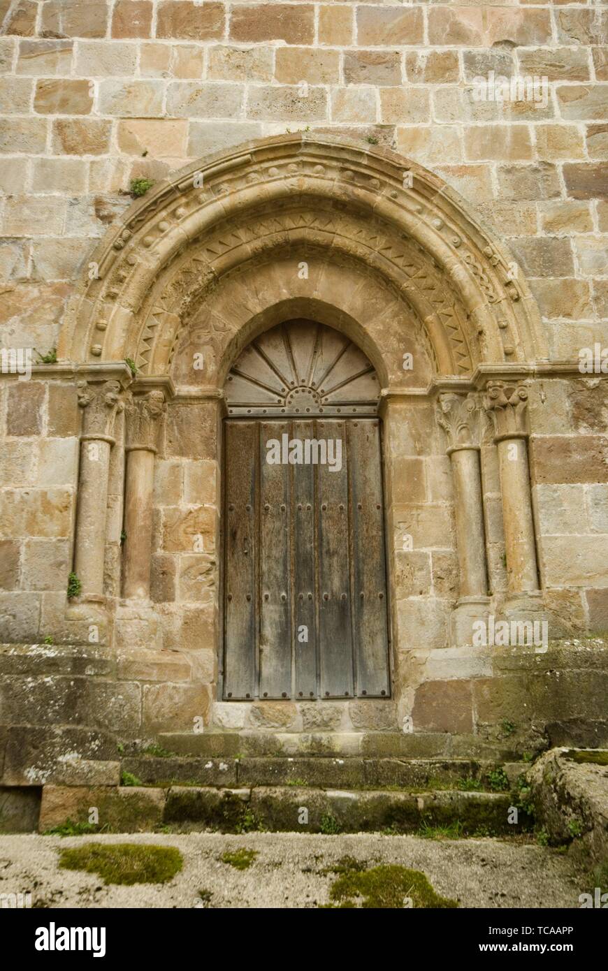 Facade And Detail Of Door With Slightly Pointed Archivolts