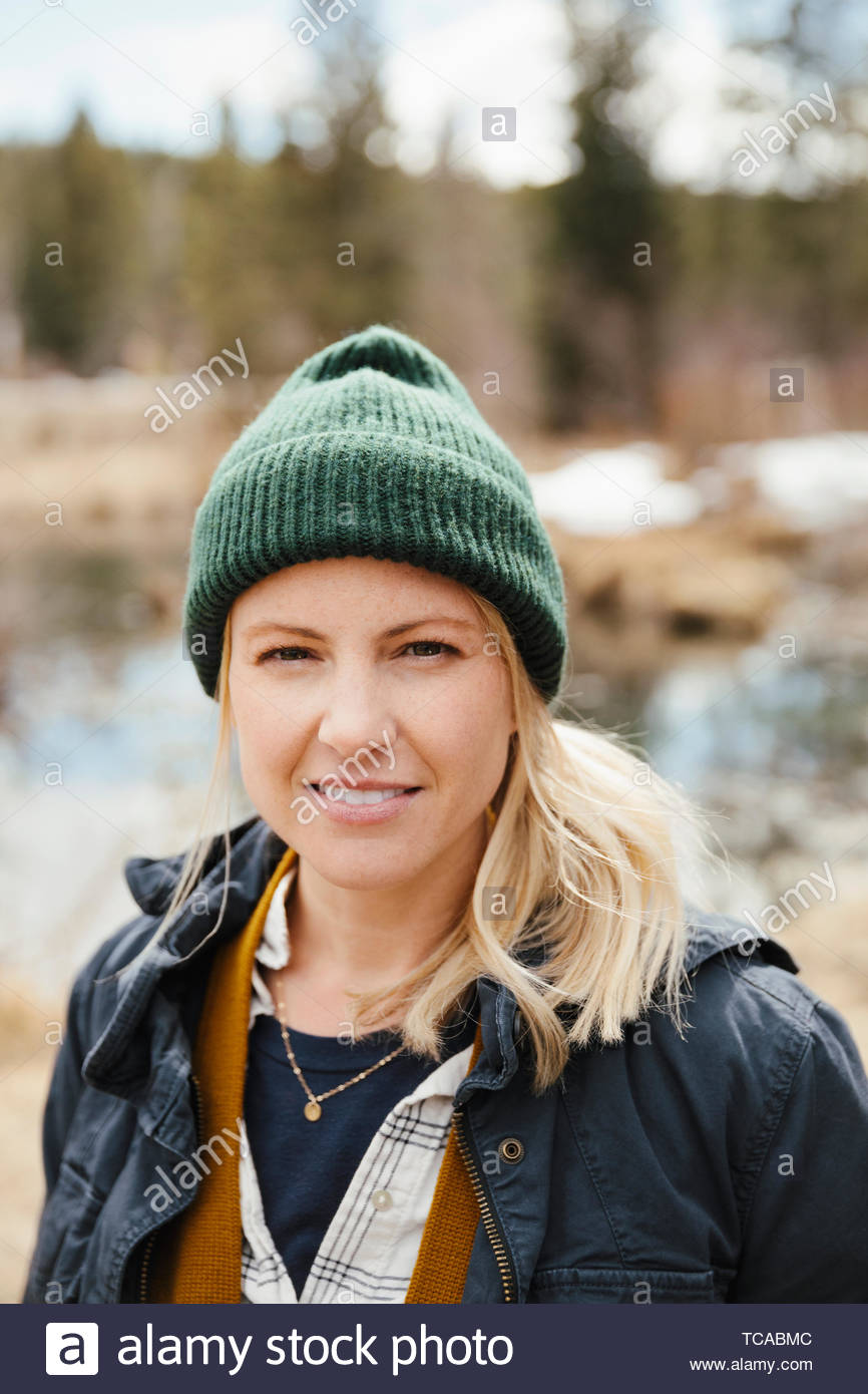 Portrait confident woman hiking Stock Photo