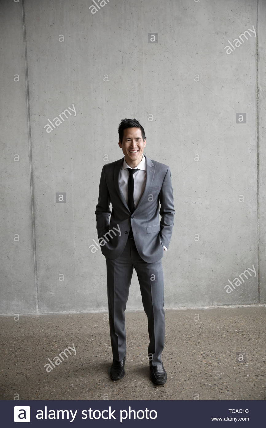 Portrait happy, confident, well-dressed businessman Stock Photo