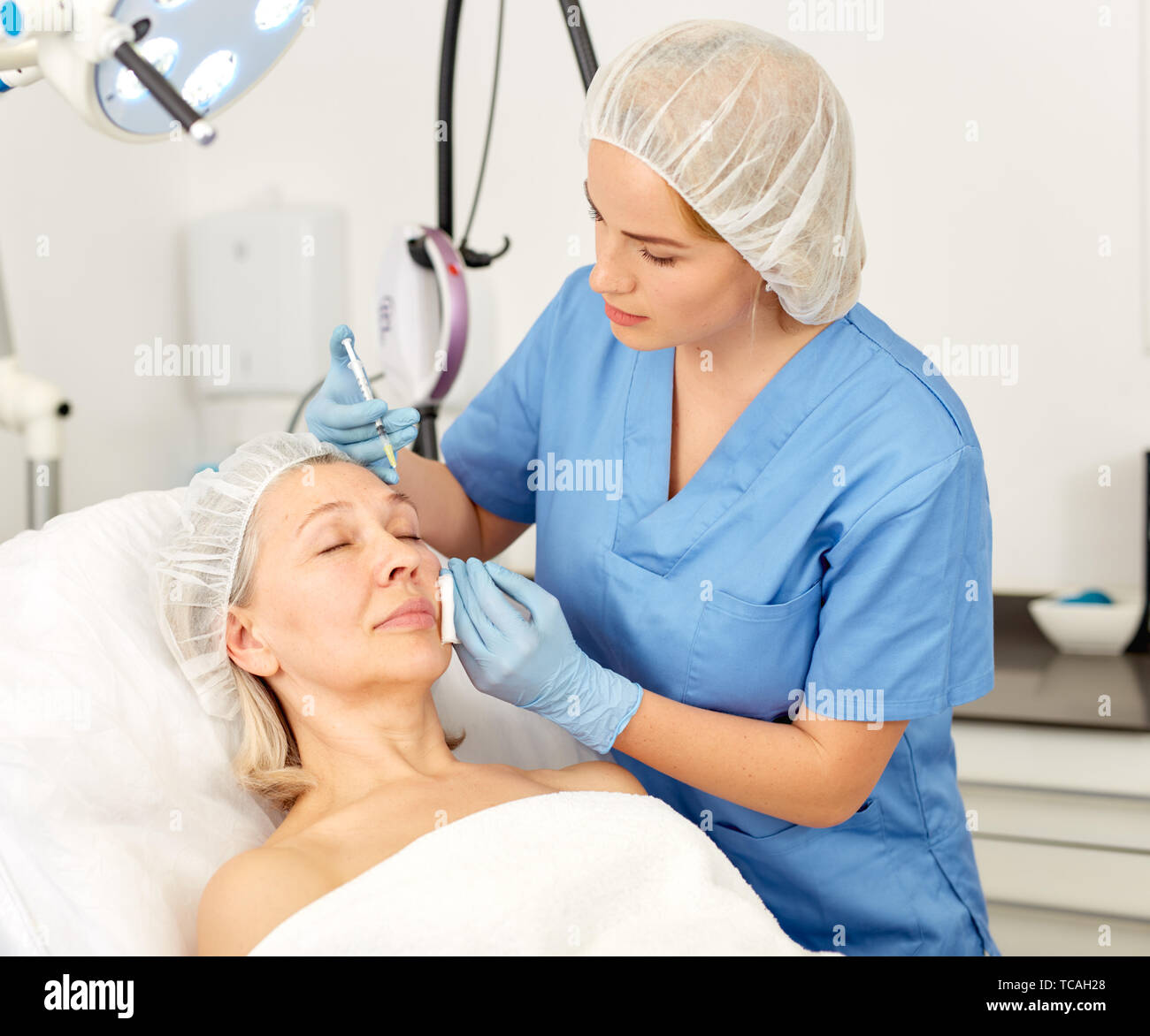 Botox injection senior woman hi-res stock photography and images - Alamy