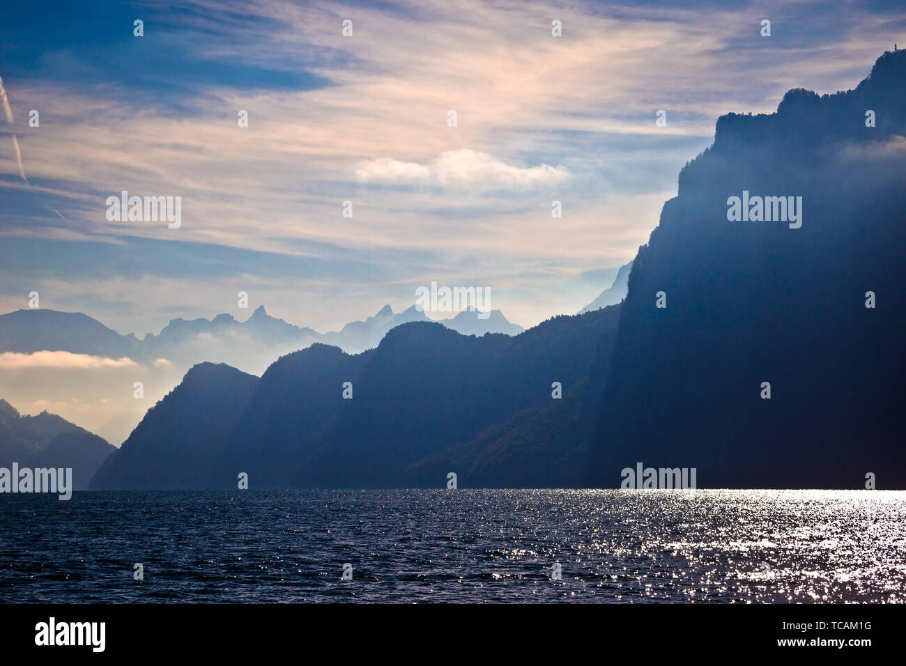 Lake Luzern alpine cliffs and dramatic lights view, amazing landscape of Switzerland Stock Photo