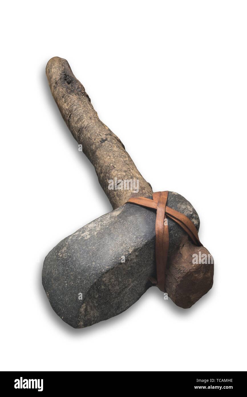 Lithic axe with wooden handle and leather strapping. Replica, Isolated over white background. Stock Photo