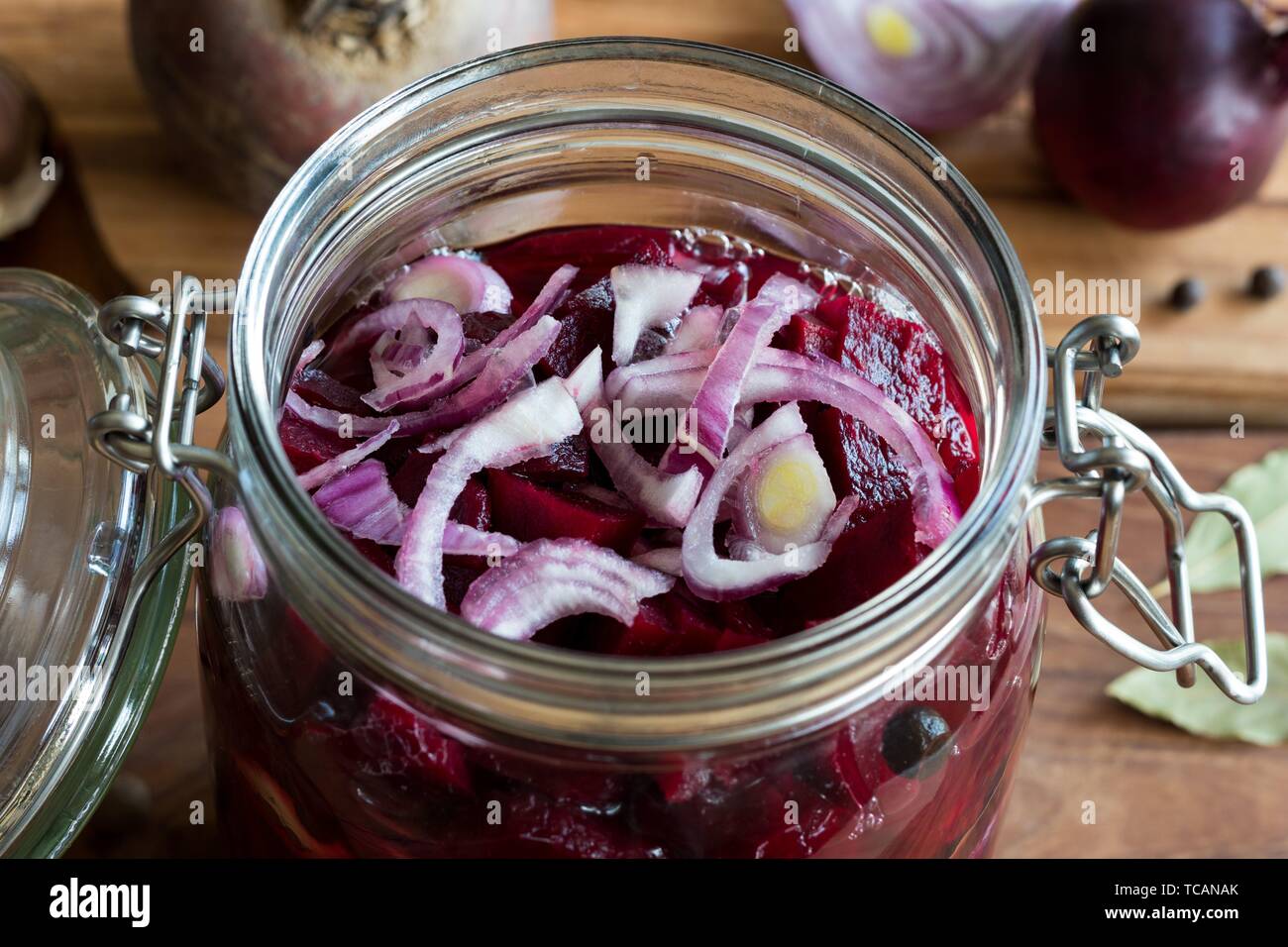 Preparation of fermented beets (beet kvass) in a glass jar Stock Photo