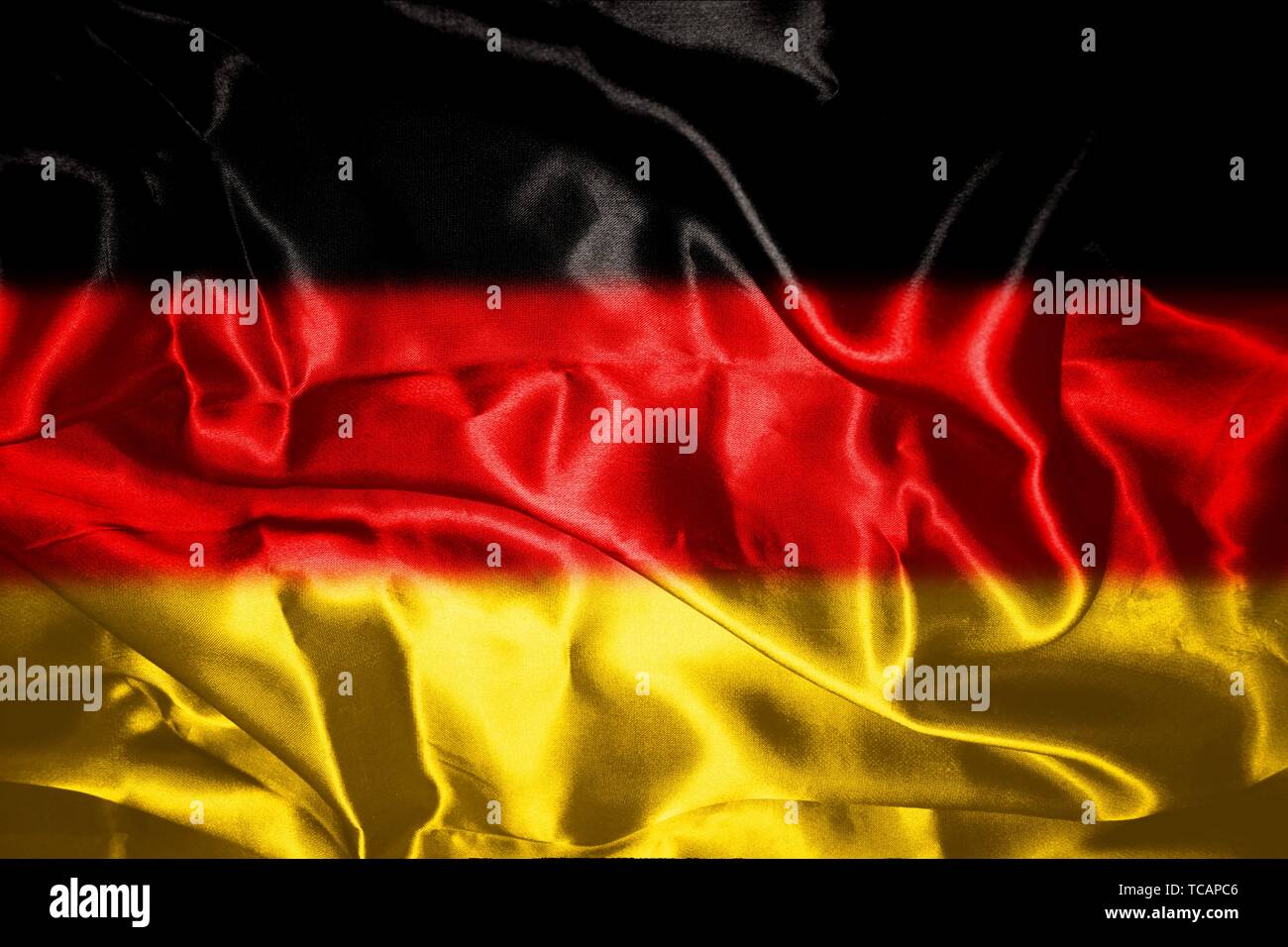 German flag blowing in the wind Stock Photo Alamy