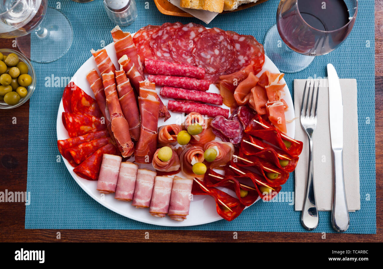 Spanish sausage sliced chorizo, fuet, jamon, salami, bacon Stock