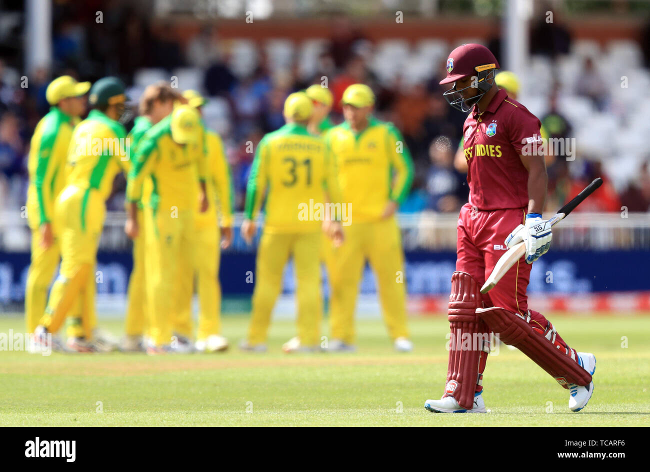 West Indies' Nicolas Pooran walks off the field after being dismissed by Australia's Adam Zampa (not pictured) during the ICC cricket World Cup group stage match at Trent Bridge, Nottingham. Stock Photo