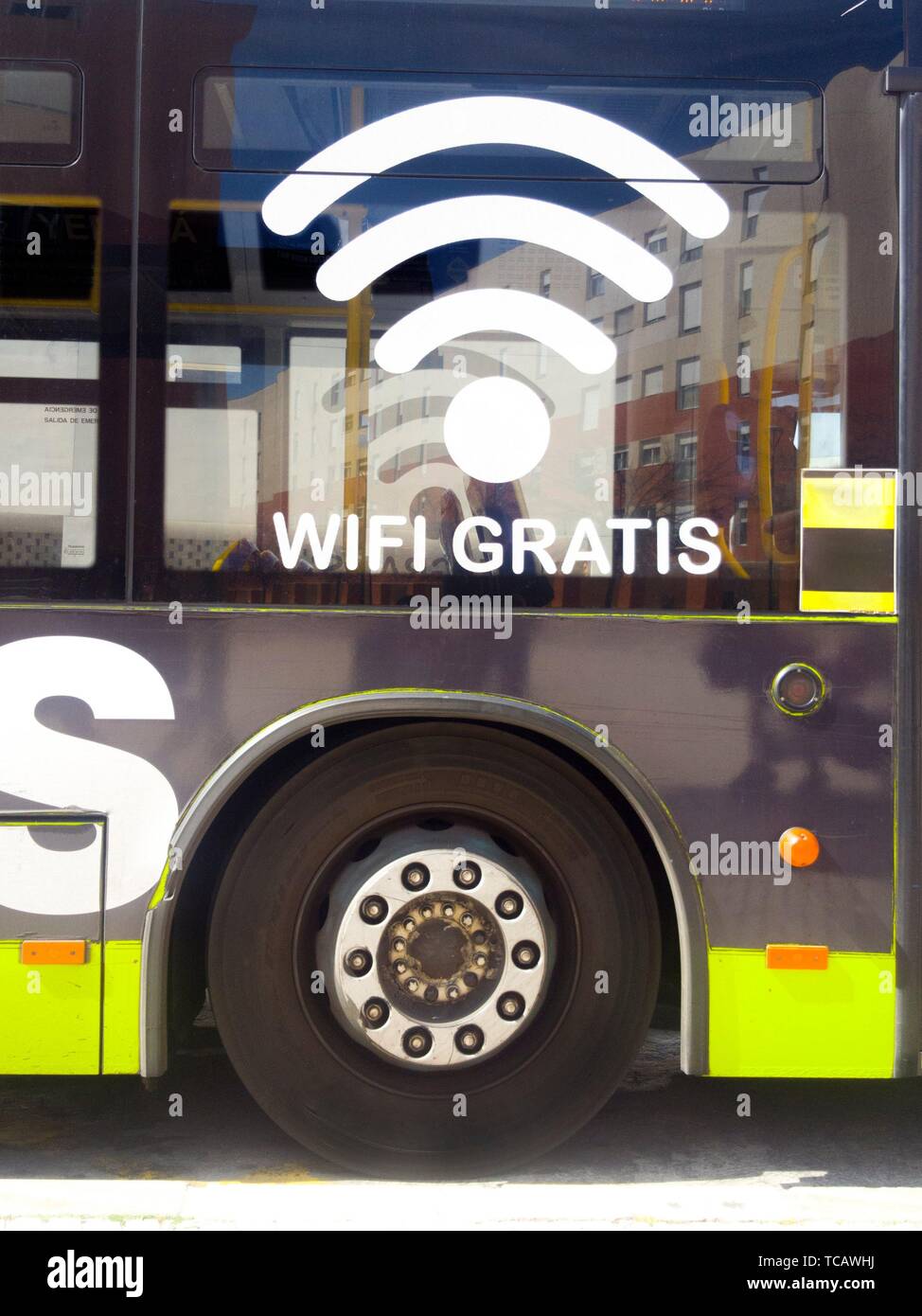 Public transport bus, with free Wi-Fi offer on board. Closeup. Stock Photo