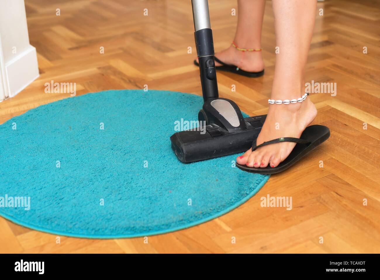 Using vacuum cleaner hi-res stock photography and images - Alamy