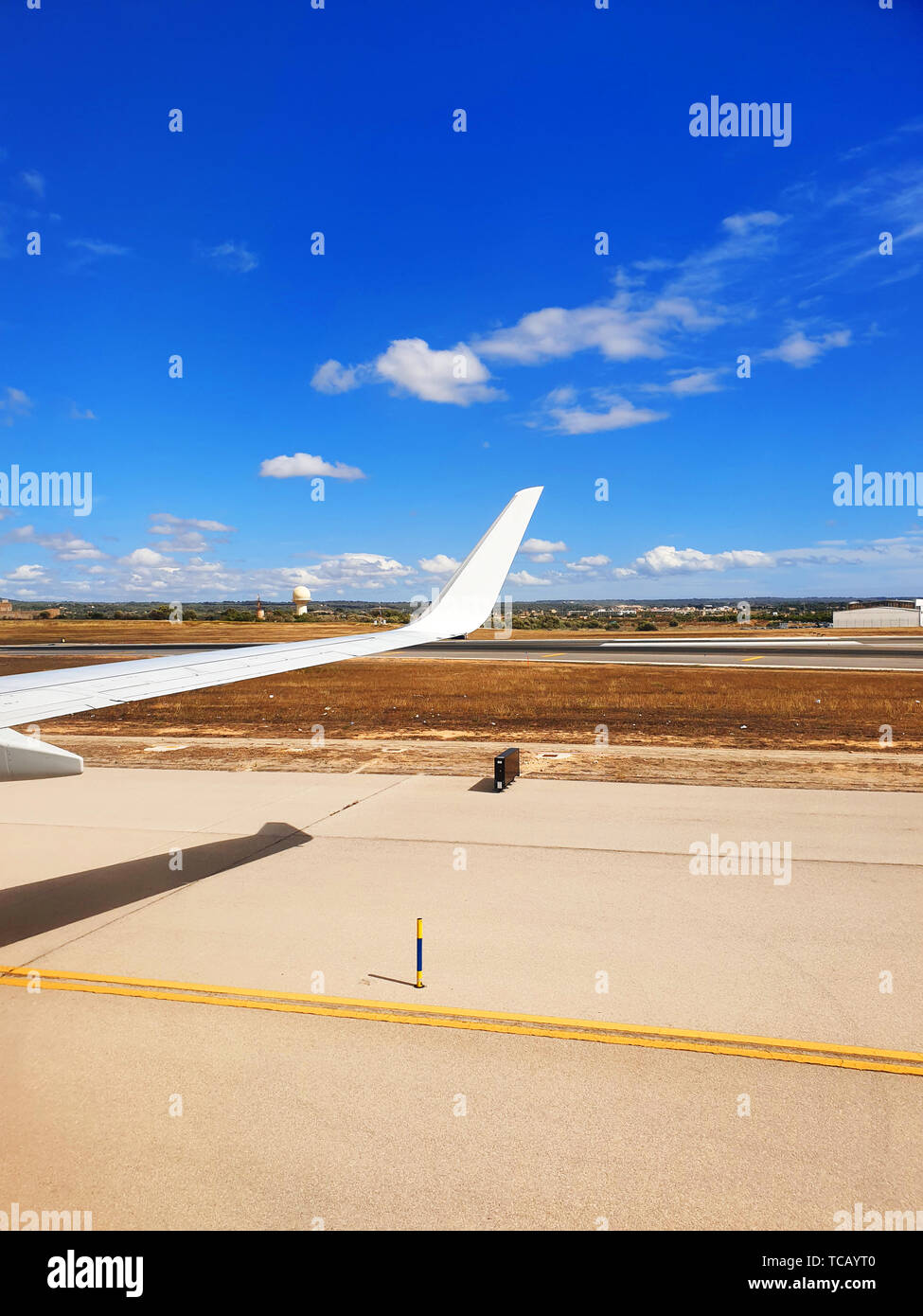 Airplane is landing at the airport in Palma de Mallorca Stock Photo