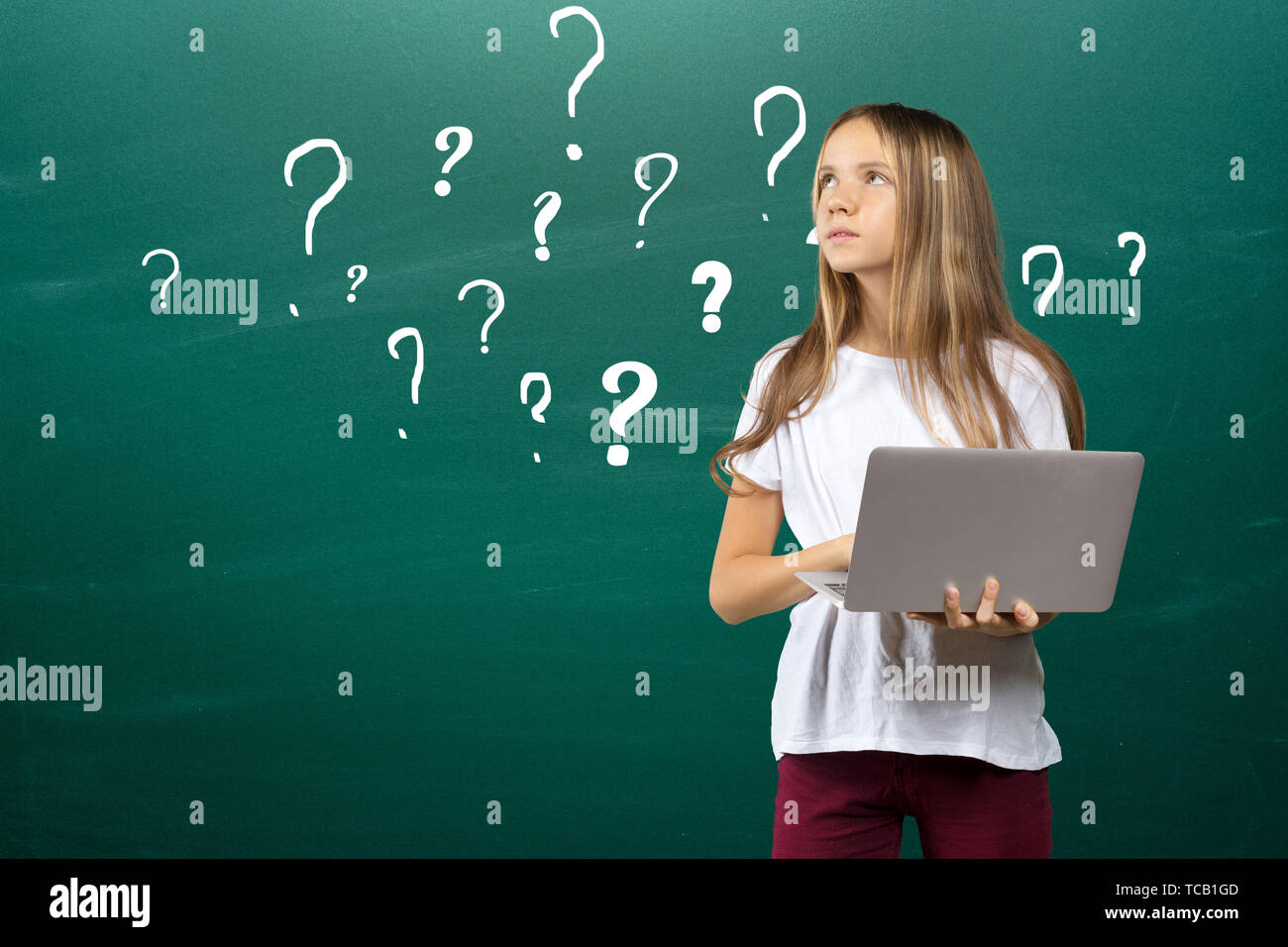 Portrait of smiling school girl child in class Stock Photo - Alamy