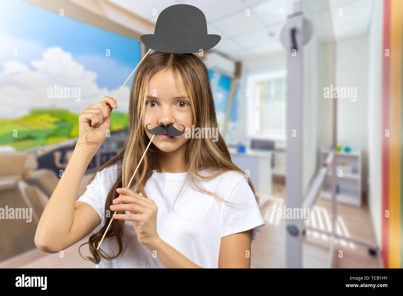Portrait of smiling school girl child in class Stock Photo - Alamy
