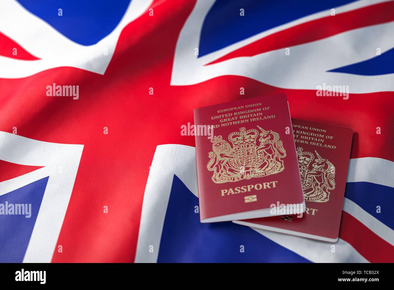 UK passport on the flag of the United Kingdom. Getting a UK passport