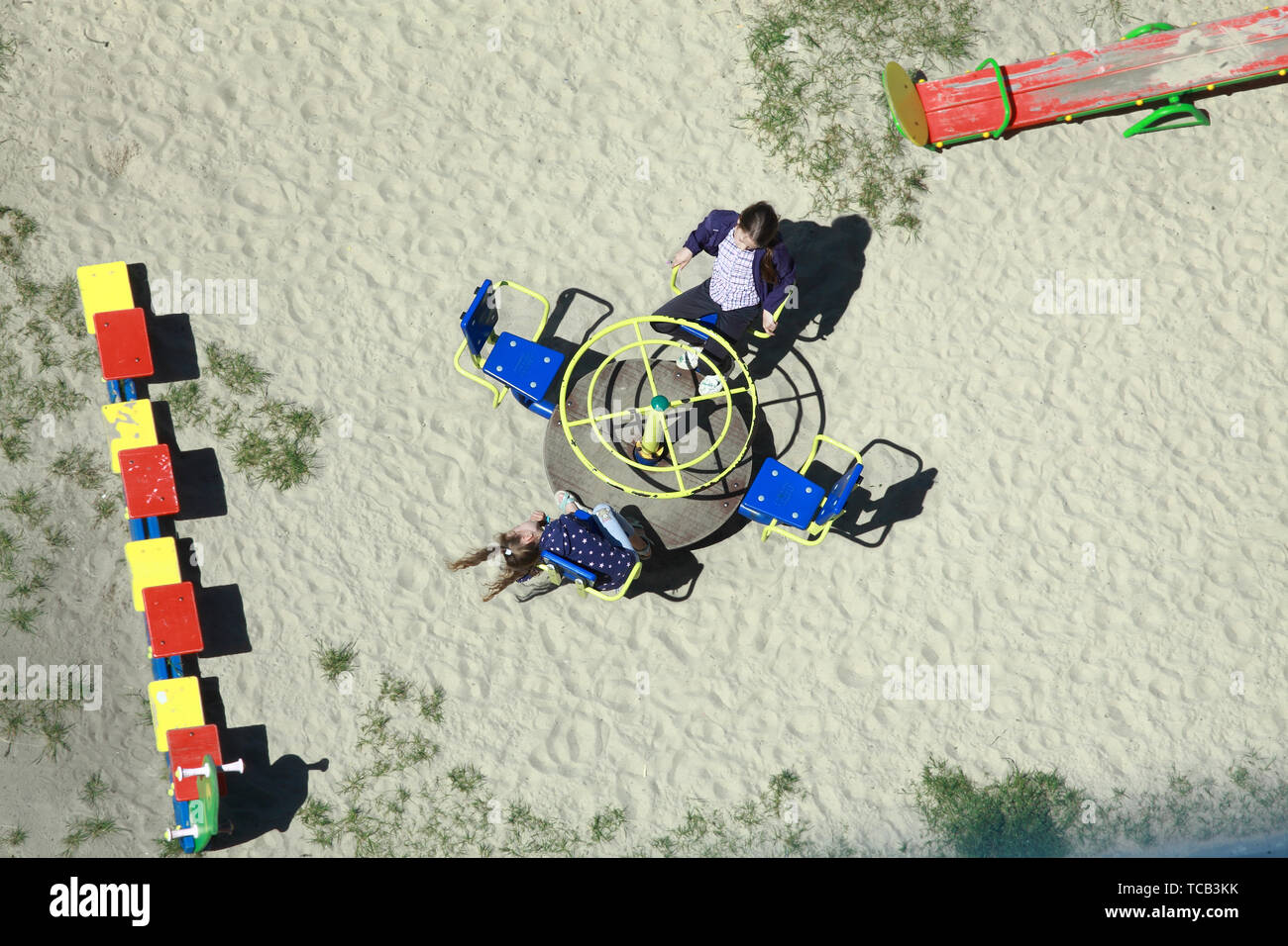 Playground ride hi-res stock photography and images - Alamy