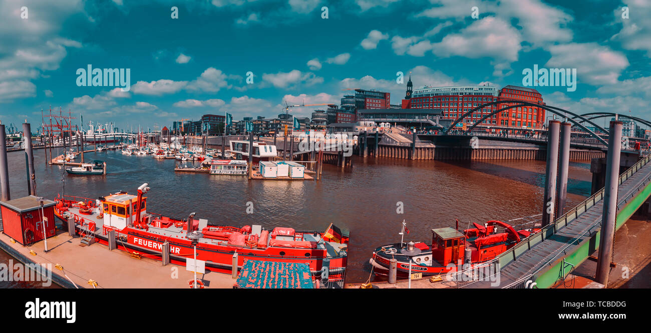 HAMBURG, GERMANY - June 01, 2019: Unidentified visitors populate the area of inner harbor and Landungsbrücken Stock Photo