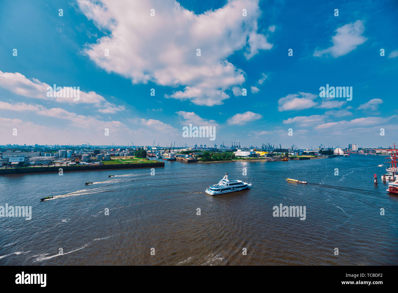 HAMBURG, GERMANY - June 01, 2019: Tourist boats and vessels drive along the river Elbe Stock Photo