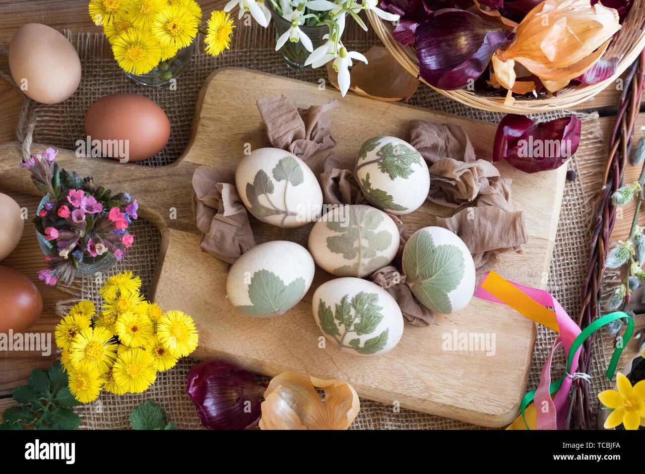 Preparation of Easter eggs for dying with onion peels eggs with a