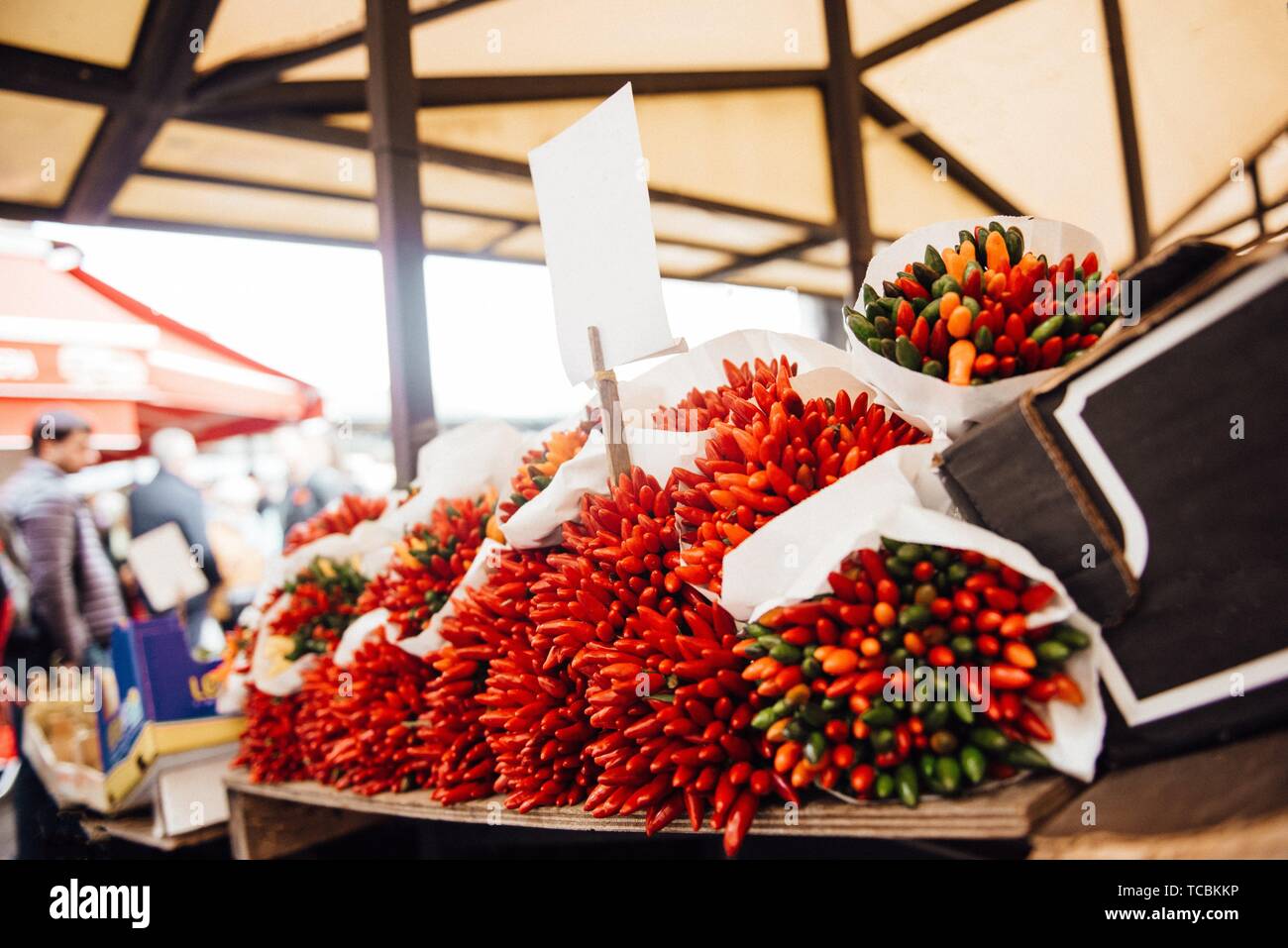 a bunch of crispy chili peppers on the market Stock Photo - Alamy