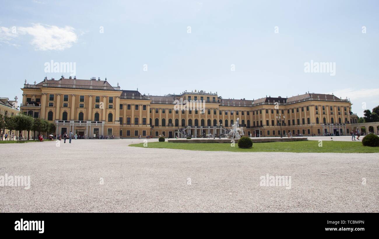 Vienna, Austria - July 06 2018: ''Schonbrunn'' palace (Schloss Schönbrunn) and the park with a blue sky and cloudsâ. “ Stock Editorial Photo. Stock Photo