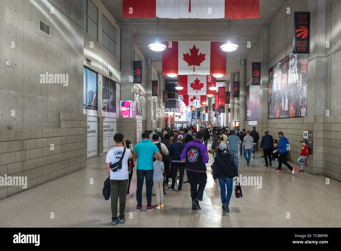 Fans with tickets lining up early to enter the Scotiabank arena. NBA playoffs fever in the Canadian city. It is the first time that the city basketbal Stock Photo