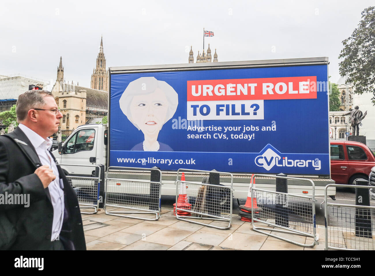 London, UK. 7th June, 2019. An ad van for a job agency in Westminster with  a caricature of Prime Minister Theresa May who officially steps down as the  Conservative Party leader but