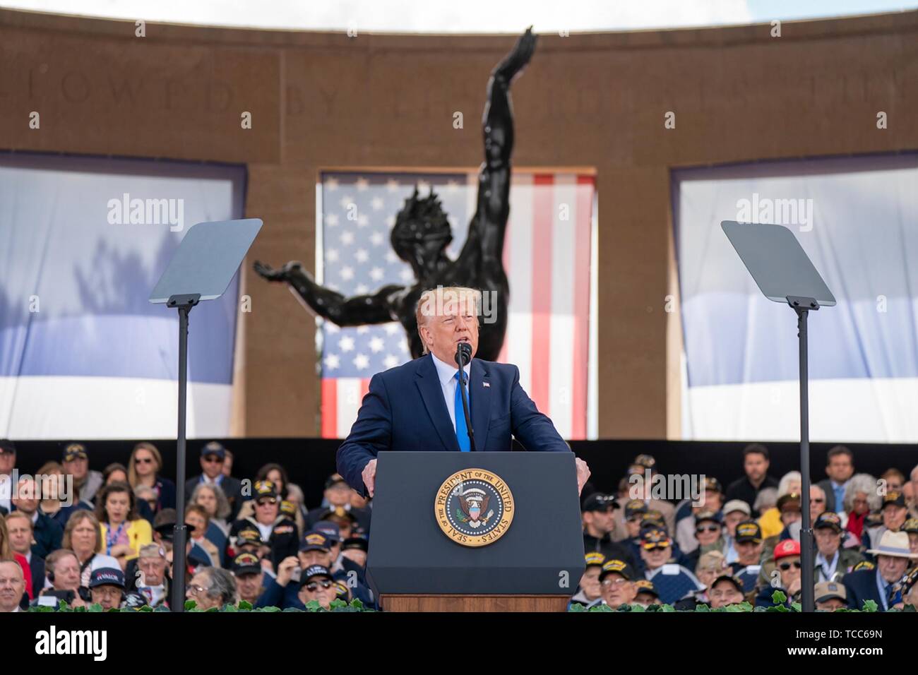 Colleville Sur Mer, France. 06th June, 2019. U.S. President Donald Trump delivers remarks during the commemoration ceremony marking the 75th D-Day Anniversary at the Normandy American Cemetery and Memorial June 6, 2019 in Colleville-sur-Mer, France. Thousands have converged on Normandy to commemorate the 75th anniversary of Operation Overlord, the WWII Allied invasion commonly known as D-Day. Credit: Planetpix/Alamy Live News Stock Photo