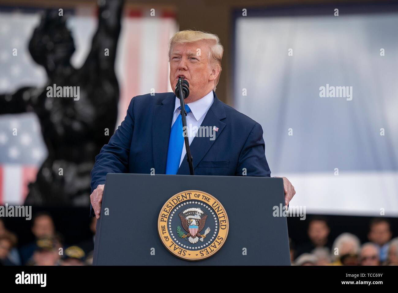 Colleville Sur Mer, France. 06th June, 2019. U.S. President Donald Trump delivers remarks during the commemoration ceremony marking the 75th D-Day Anniversary at the Normandy American Cemetery and Memorial June 6, 2019 in Colleville-sur-Mer, France. Thousands have converged on Normandy to commemorate the 75th anniversary of Operation Overlord, the WWII Allied invasion commonly known as D-Day. Credit: Planetpix/Alamy Live News Stock Photo