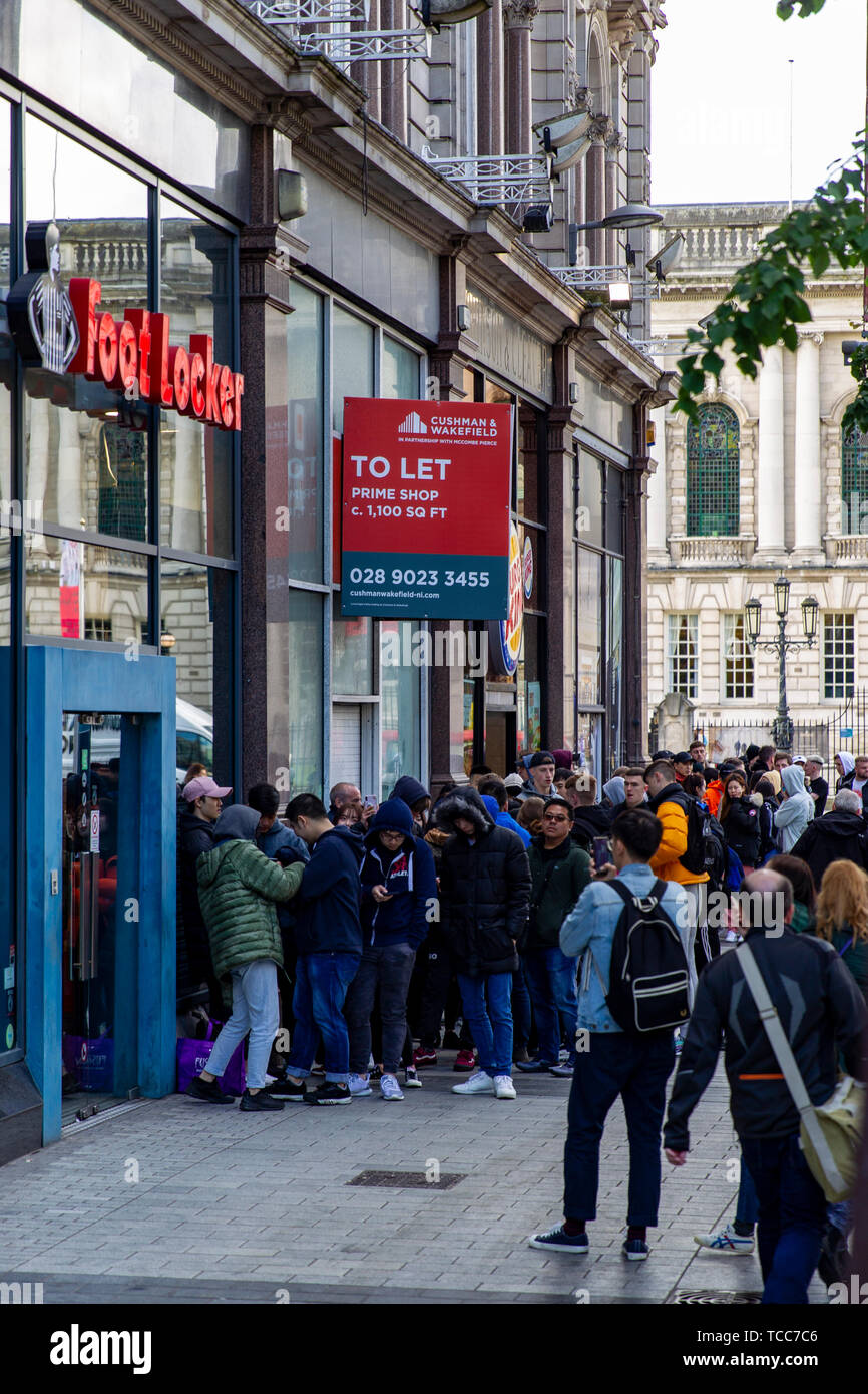 Donegall Place, Belfast, UK 7th June 2019. a Large queue gathers outside the Foot Locker store in Belfast City Centre the Yeezy Boost 350 V2 went on sale at 9:00am this