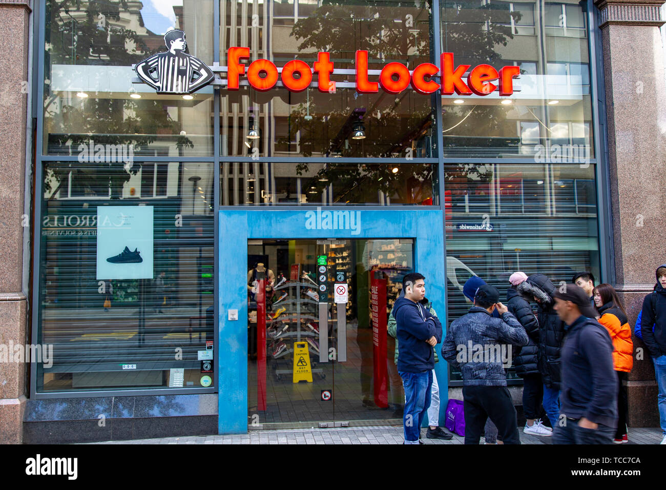 Donegall Place, Belfast, UK 7th June 2019. a Large queue gathers outside  the Foot Locker store in Belfast City Centre where the Yeezy Boost 350 V2  went on sale at 9:00am this