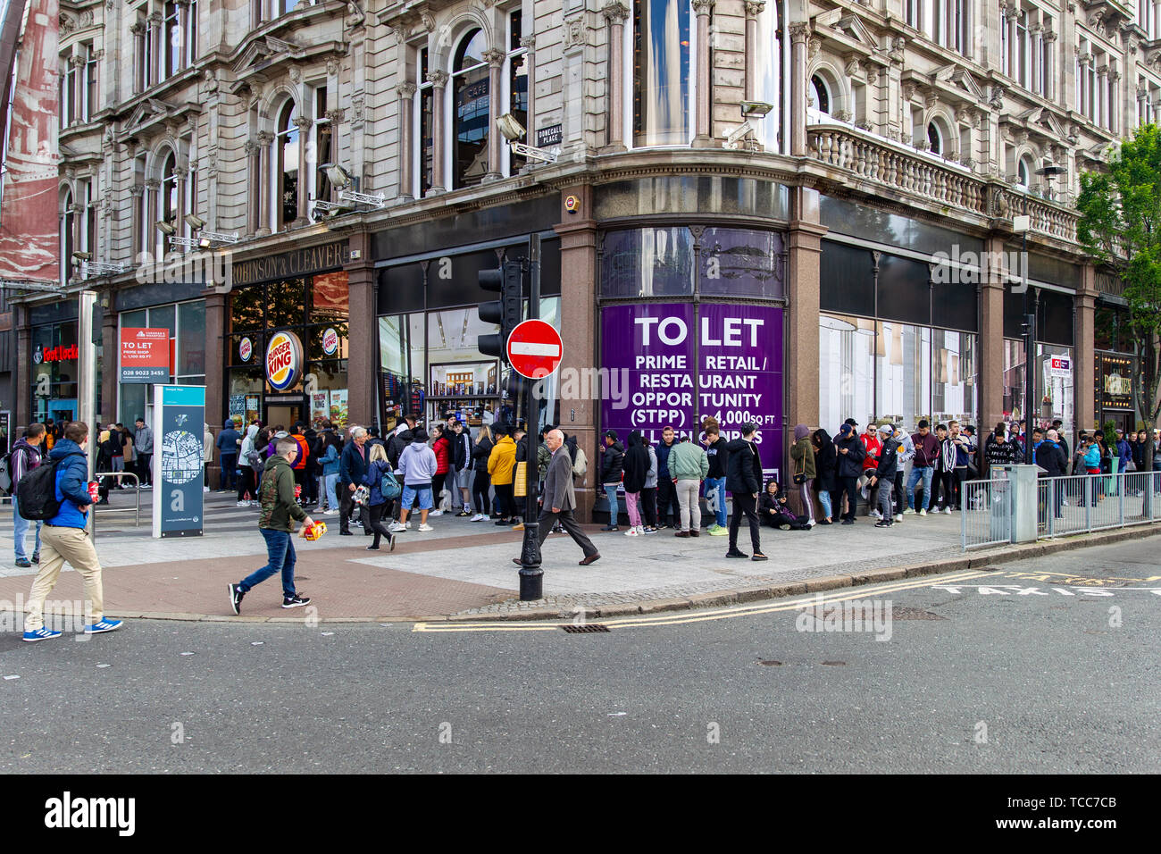 Donegall Place, Belfast, UK 7th June 2019. a Large queue gathers outside the Foot Locker store in Belfast City Centre the Yeezy Boost 350 V2 went on sale at 9:00am this