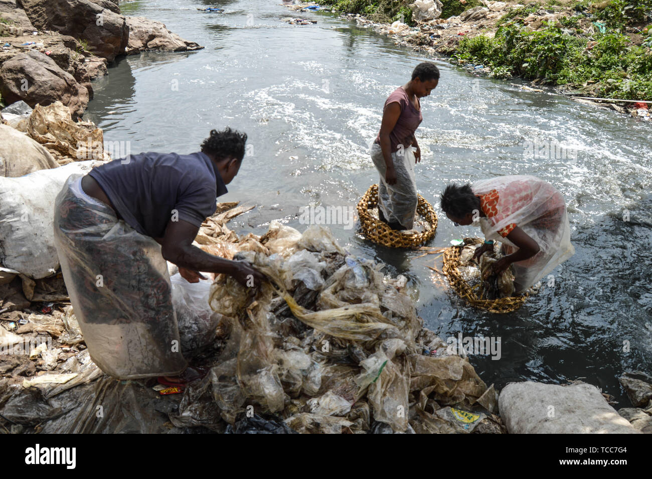 Nairobi, Kenya. 13th Sep, 2018. Women seen washing sheets of plastic in