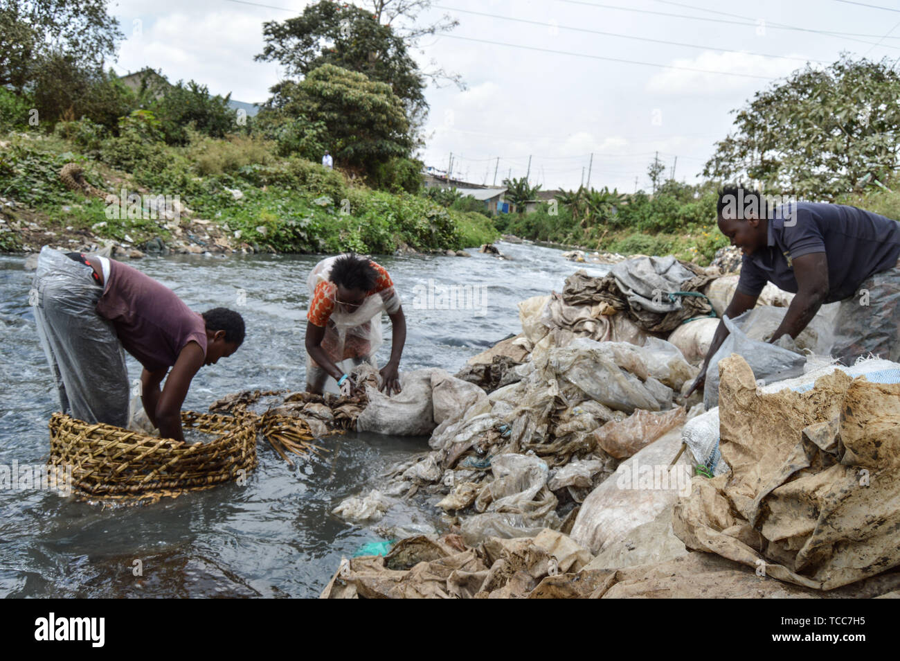 Nairobi, Kenya. 13th Sep, 2018. Women seen washing sheets of plastic in