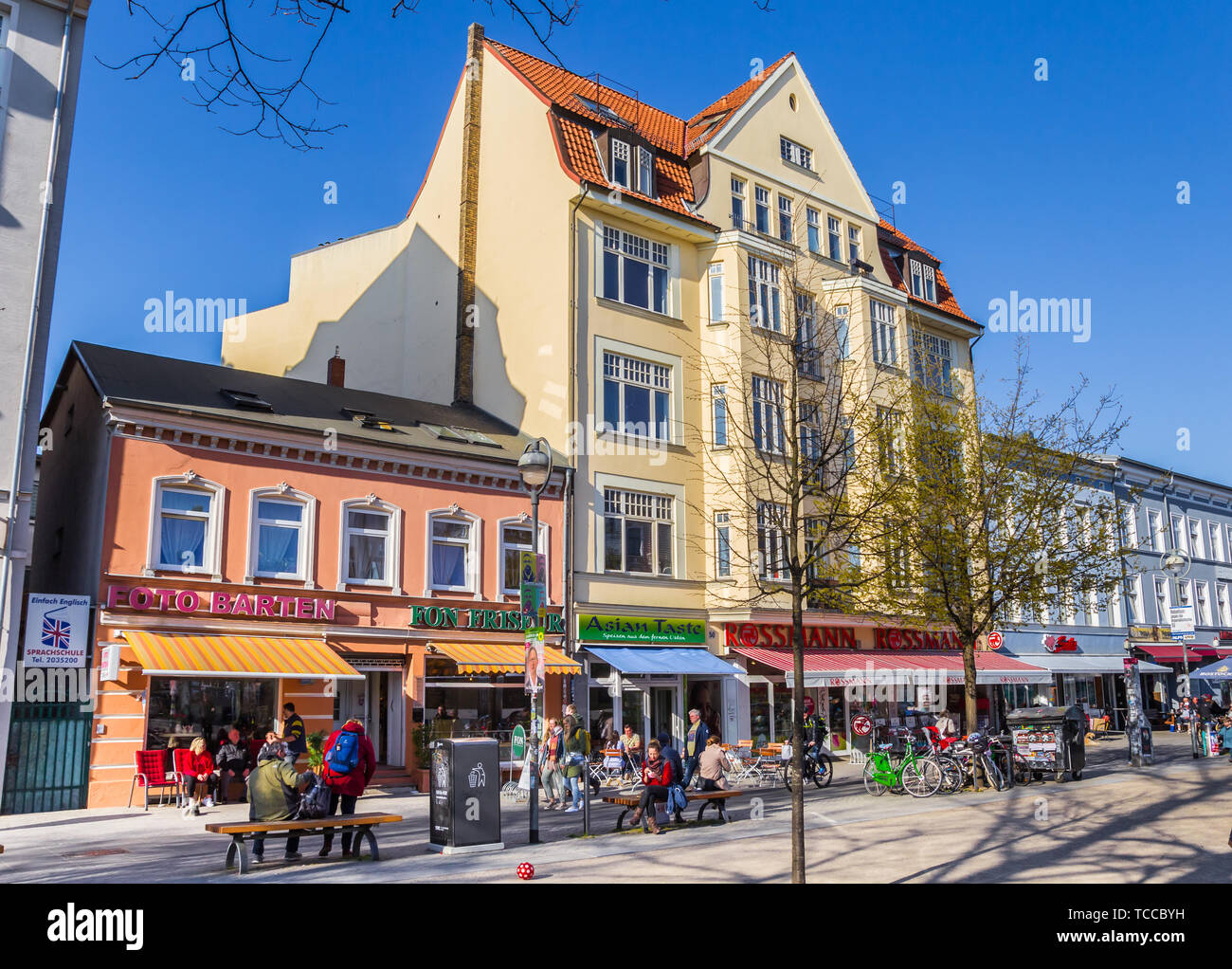 Colorful shoppng street at the Brink square of Rostock, Germany Stock Photo