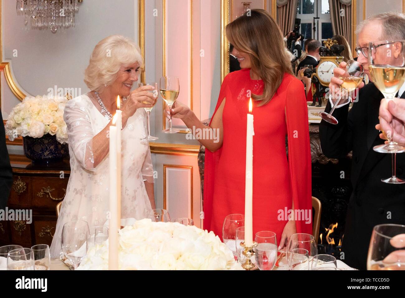 U.S First Lady Melania Trump toasts with the Duchess of Cornwall during a gala at Winfield House hosted by the Trumps June 4, 2019 in London, England. Stock Photo